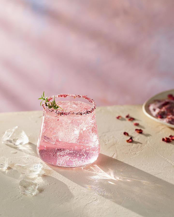 Pink Gin With Lemonade Photograph by James Lee