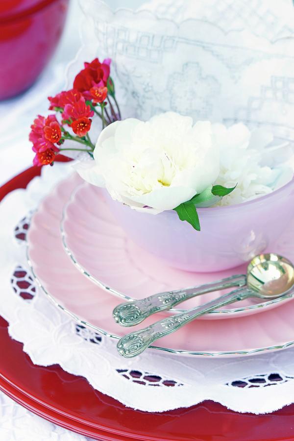 Pink Place Setting Decorated With Flowers & Doilies Photograph by Angelica Linnhoff