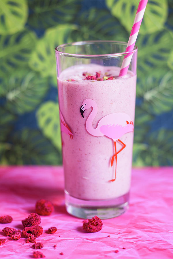 Pink Raspberry Milkshake In A Glass With A Flamingo On It Photograph by Susan Brooks-dammann