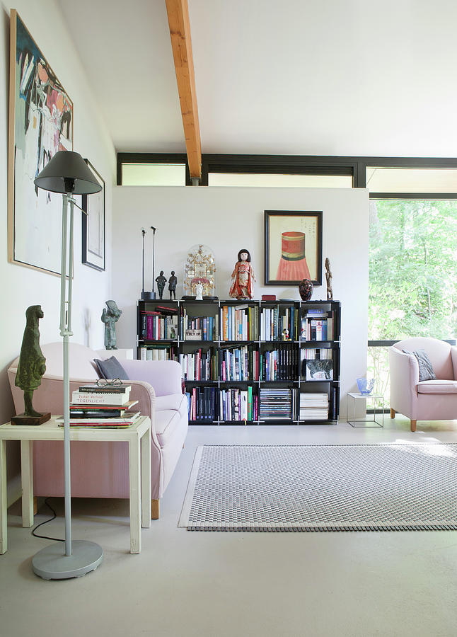 Pink Sofa And Modular Shelving In Living Room With Glass Wall Photograph by Gonkel/stegeman