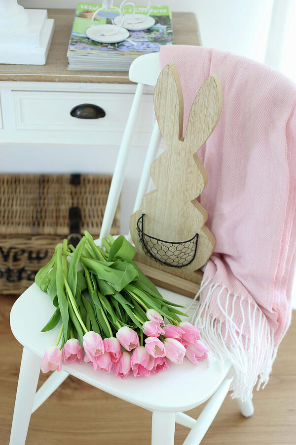 Easter Photograph - Pink Tulips And Wooden Bunny On A White Chair by Tabea Steinhauer