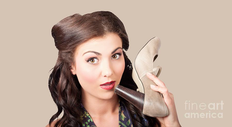 Pinup vintage woman chatting on shoe phone Photograph by Jorgo Photography