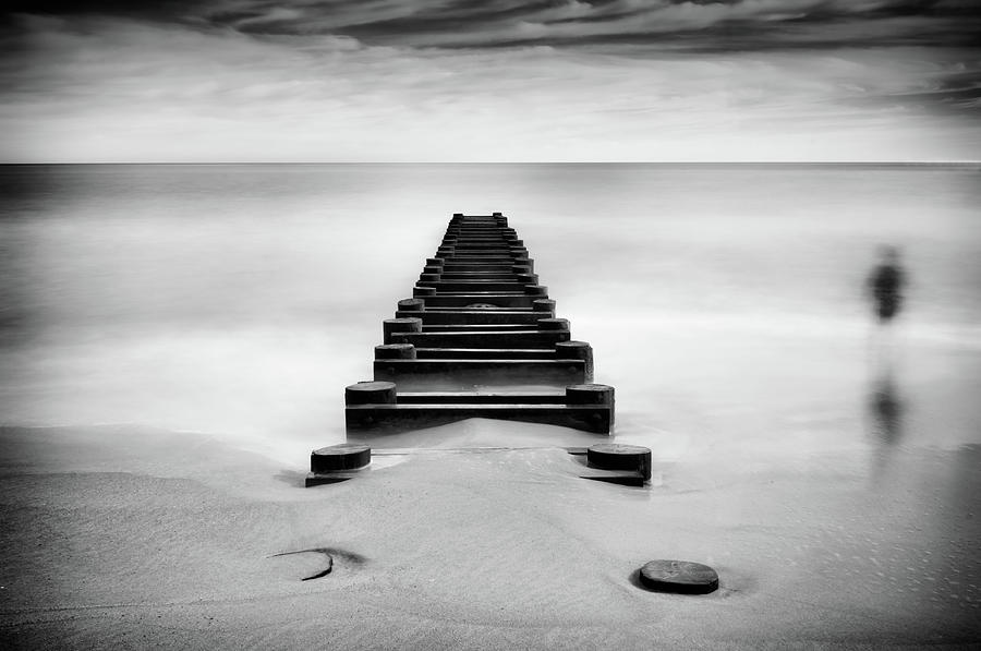 Black And White Photograph - Pipeline Extending Into Ocean by Marianne Macgregor