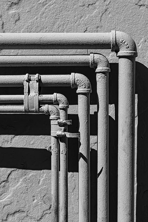 Pipes on Exterior Wall Photograph by Robert Ullmann