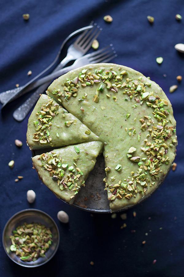 Pistachio Cheesecake With A Pistachio Glaze And Chopped Pistachios Sliced Seen From Above 2702