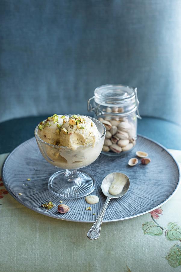 Pistachio Ice Cream In An Ice Cream Bowl Photograph by Magdalena Hendey