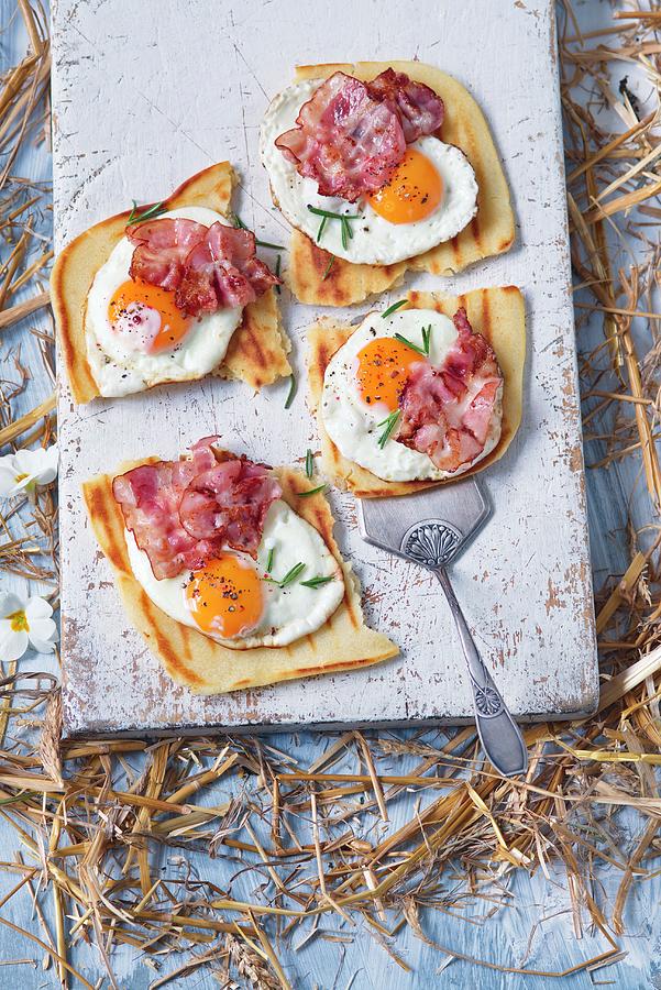 Pita Bread Served With Fried Eggs And Bacon Photograph by Alena Hrbkov