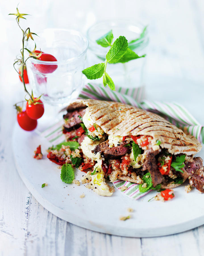 Pitta Flatbread With Lamb, Mint, Quinoa, Hummus And Red Peppers Photograph by Karen Thomas