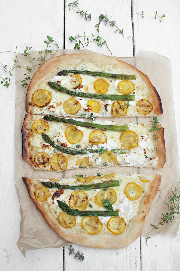 Pizza Bianca With Ricotta, Mozzarella, Yellow Courgette, Asparagus And Lemon Thyme Photograph by Kachel Katarzyna