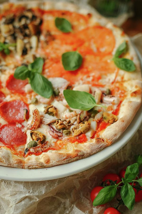 Pizza Quattro Stagioni With Salami, Seafood, Tomatoes And Mushrooms Photograph by Kuzmin5d