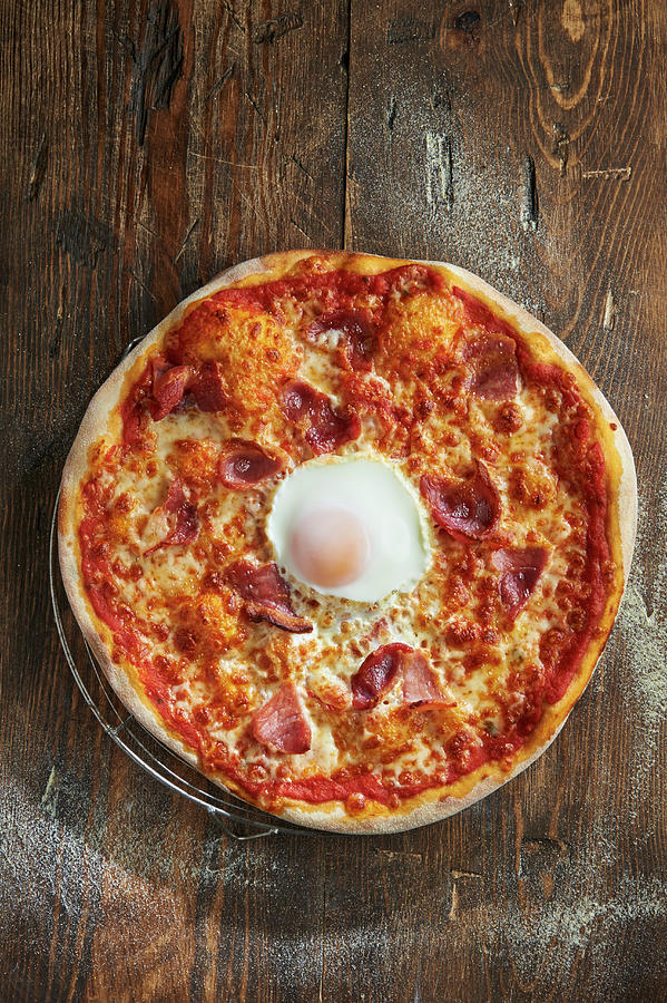 Pizza Rustica With Egg And Bacon Photograph by William Reavell