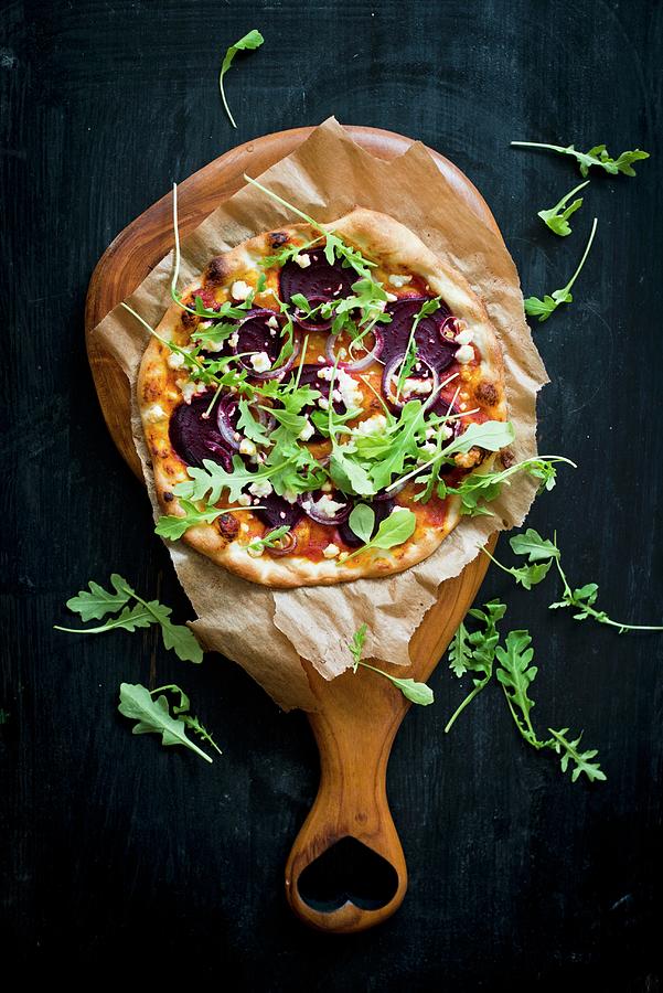 Pizza With Beetroot And Rocket Photograph by Dorota Indycka