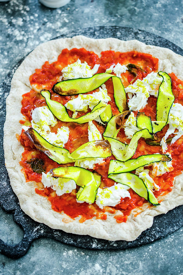 Pizza With Courgette, Mozzarella Cheese, And Tomato Sauce Photograph by Karen Thomas