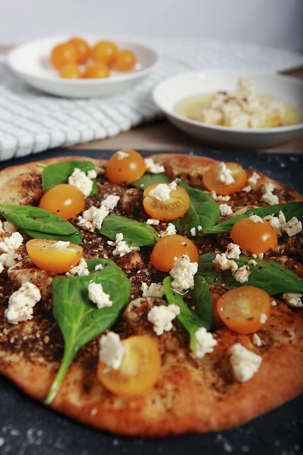 Pizza With Spinach, Tomatoes, Feta And Zaatar spice Mix From North Africa Photograph by Yellow Street Photos