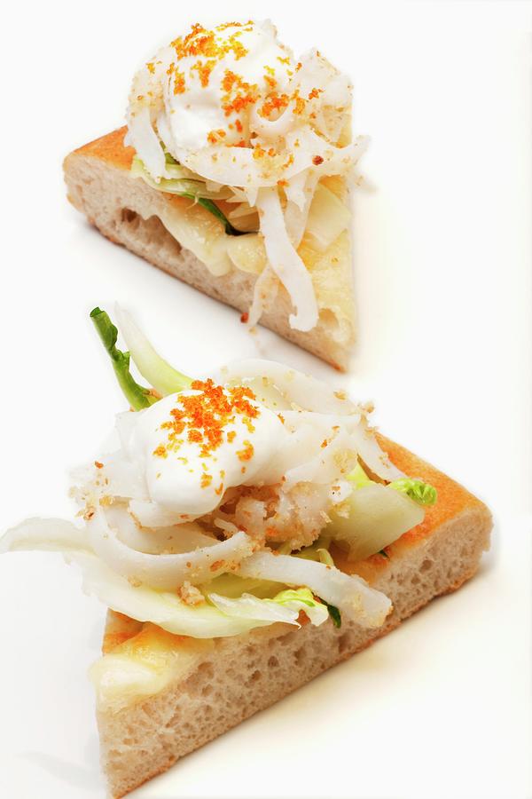 Pizza With Squid, Chicory, Yoghurt Foam And Grey Mullet Roe Photograph by Paolo Della Corte