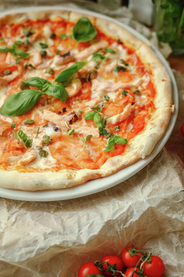 Pizza With Tomatoes, Salmon And Capers Photograph by Kuzmin5d