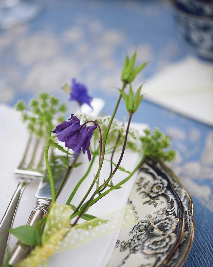 Place Setting Decorated With Wild Flowers For Midsummer Festival Photograph by Hannah Kompanik