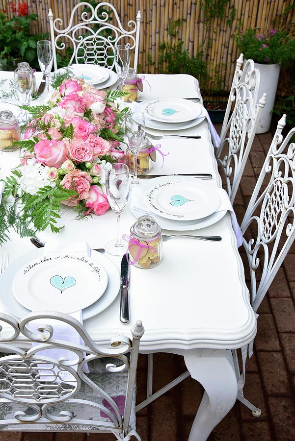 Place Settings With Painted Hearts On A Festively Laid Table Photograph by Great Stock!