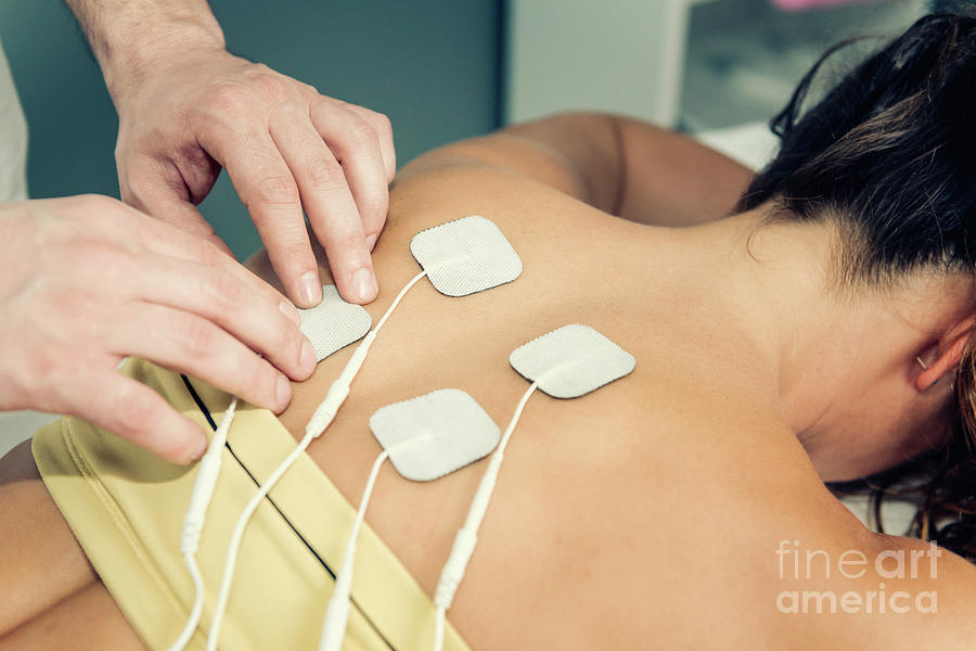 Physical Therapy Photograph - Placing Tens Electrodes On Upper Back by Microgen Images/science Photo Library