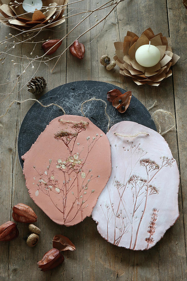 Plant Impressions In Clay And Paper Flower Tealight Holders Photograph by Regina Hippel