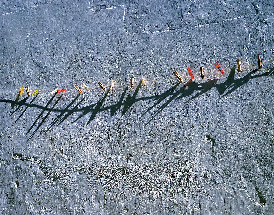 Plastic And Wooden Pegs On A Rope Washing Line With A Textured W ...