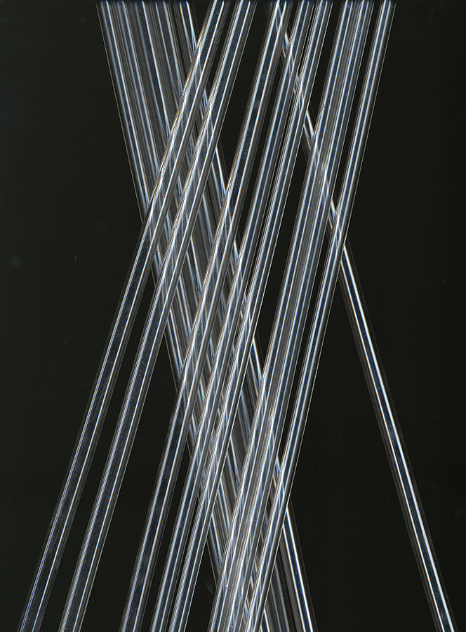 Plastic Light Bars Crossing Photograph by Lumina Imaging