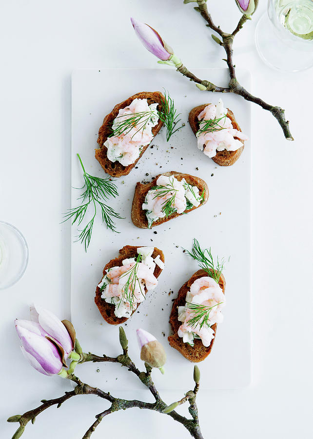 Plate Of Bread With Shrimp Topping Photograph by Line Klein