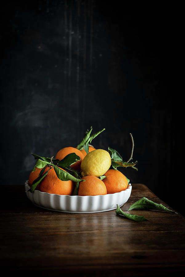Plate With Oranges And Lemons Photograph by Justina Ramanauskiene