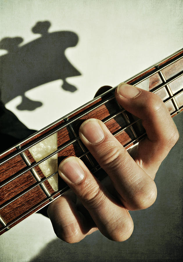 Playing Bass Guitar Photograph by Photo - Lyn Randle