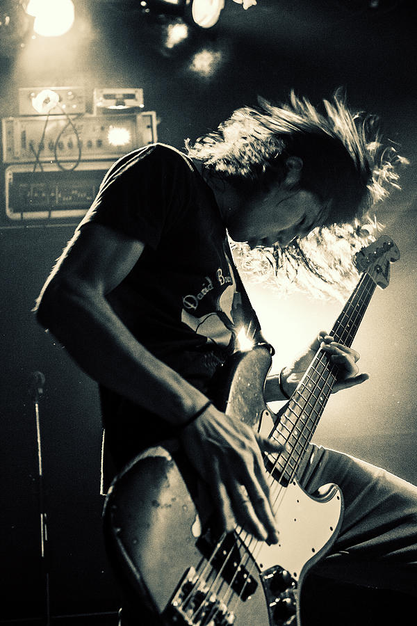 Playing Bassguitar Photograph by Kenji Nakamatsu
