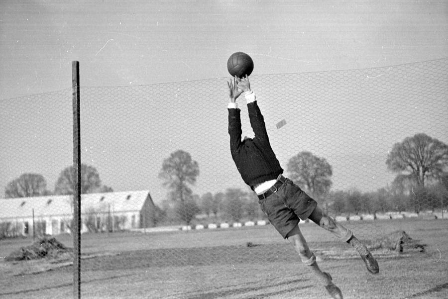 Playing In Goal Photograph by Kurt Hutton Playing In Goal Photograph by Kurt Hutton
