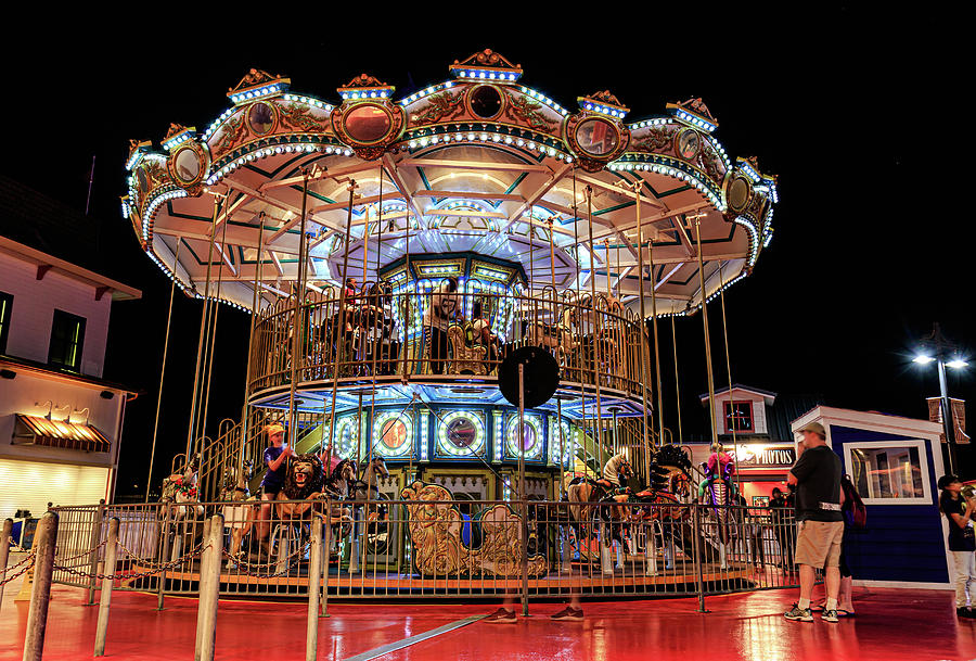 Pleasure Pier's Carousel ride Photograph by David Ilzhoefer Fine Art