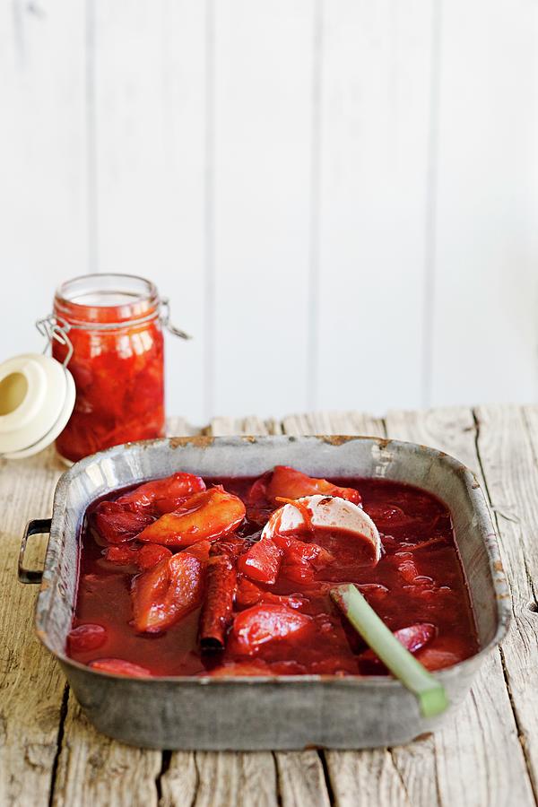 Plum Compote With A Glass Jar Photograph by Tina Engel