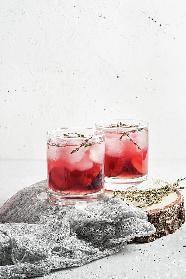 Plum Lemonade With Ice And Thyme Photograph by Julie Taras