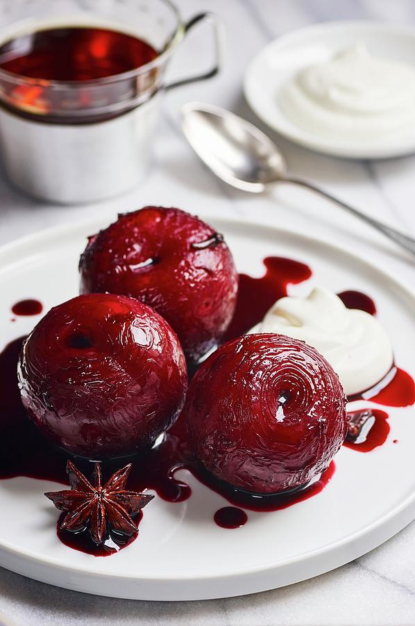 Plums Poached In Port Wine With Spices Photograph by Ulrike Emmert