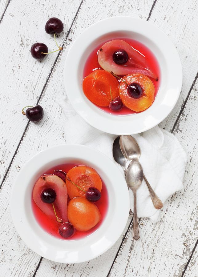 Poached Fruit With Vanilla Photograph by Jane Saunders