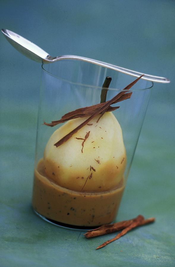Poached Pear With Cinnamon And Morels Photograph by Paquin