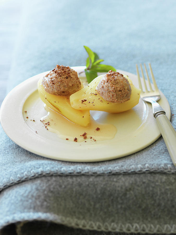 Poached Pears Filled With A Chestnut Cream Photograph by Andreas Thumm