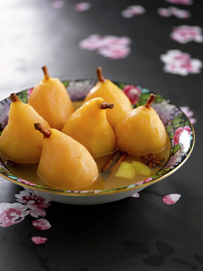 Poached Pears In A Spicy Sauce Photograph by Bill Kingston