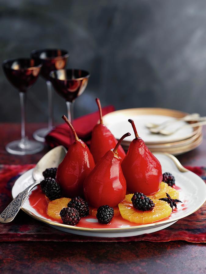Poached Red Wine Pairs With Blackberries And Orange Slices Photograph by Gareth Morgans