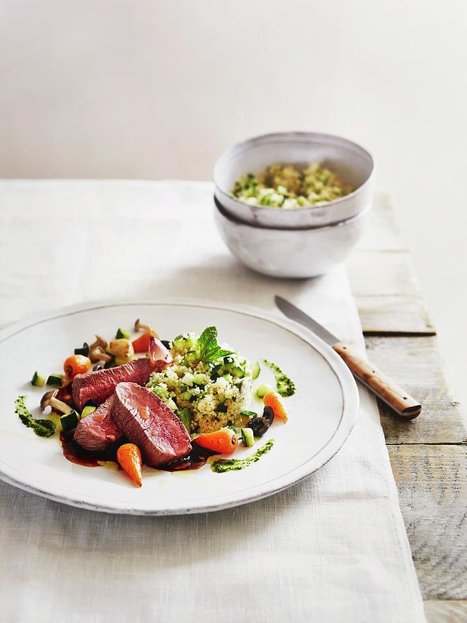 Poached Saddle Of Lamb With Mint Couscous And Spring Vegetables Photograph by Thorsten Kleine Holthaus