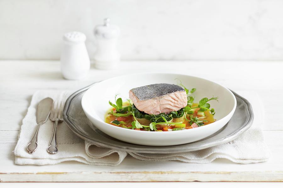 Poached Salmon Fillet On A Bed Of Vegetables Photograph by Charlotte Tolhurst