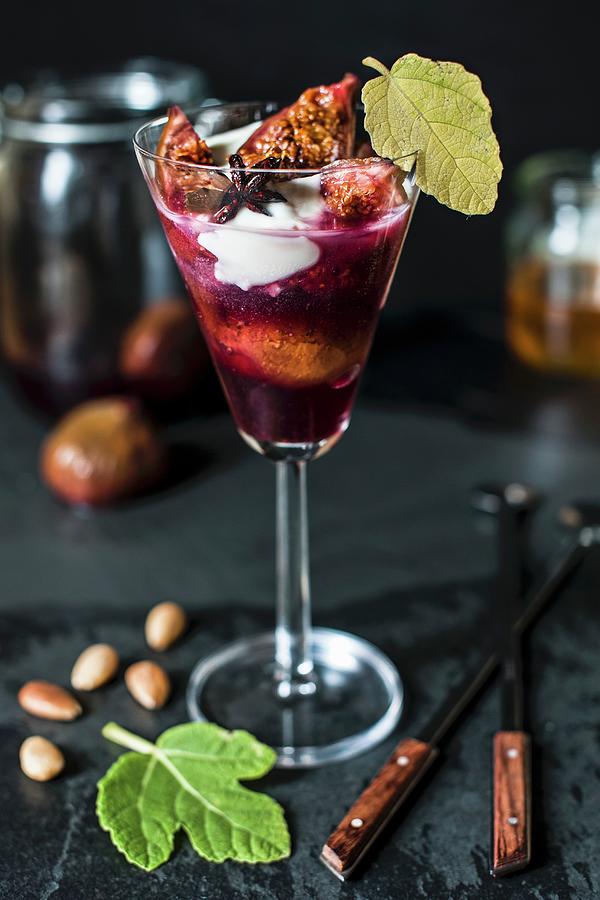 Poached Spiced Figs With Crme Frache In A Stemmed Glass Photograph by Magdalena Hendey