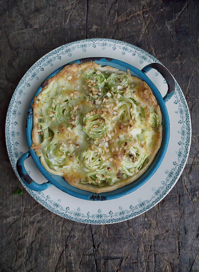 Pointed Cabbage Quiche With Hazelnuts Photograph by Martina Schindler