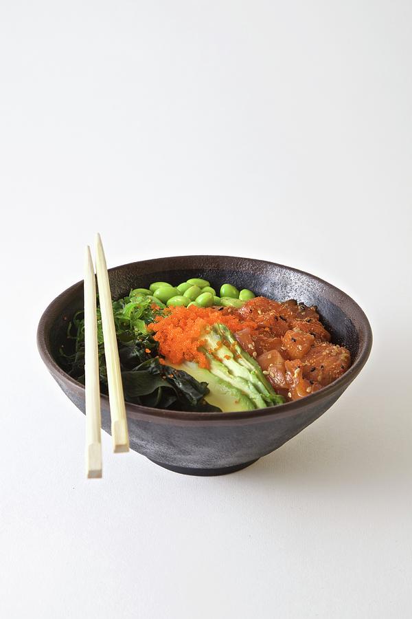 Poke Bowl With Salmon, Edamame, Seaweed And Sesame Oil Photograph by Andre Baranowski