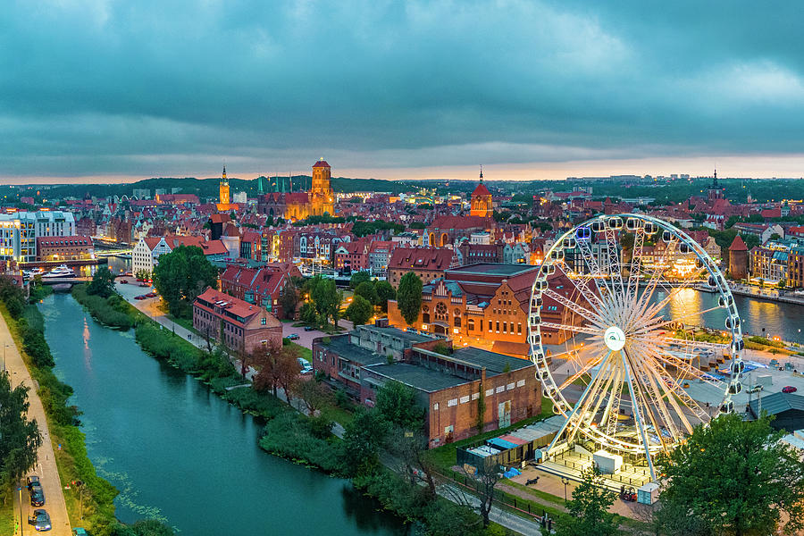 Poland, Pomerania, Gdansk, Baltic Sea, Motlawa, Ferris Wheel, Motlawa River, St. Johns Church And St. Marys Basilica At Blue Hour Digital Art by Manfred Bortoli
