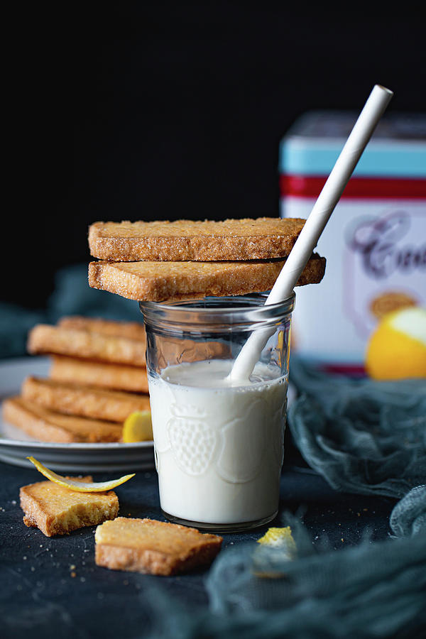 Polenta Cookies On Glass Of Milk Photograph by Mimis Kingdom
