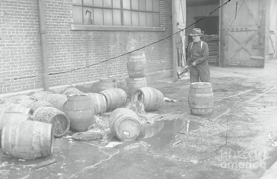 Police Emptying Whiskey Barrels Photograph by Bettmann