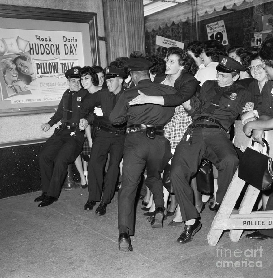 Police Hold Girls Wanting To See Hudson Photograph by Bettmann