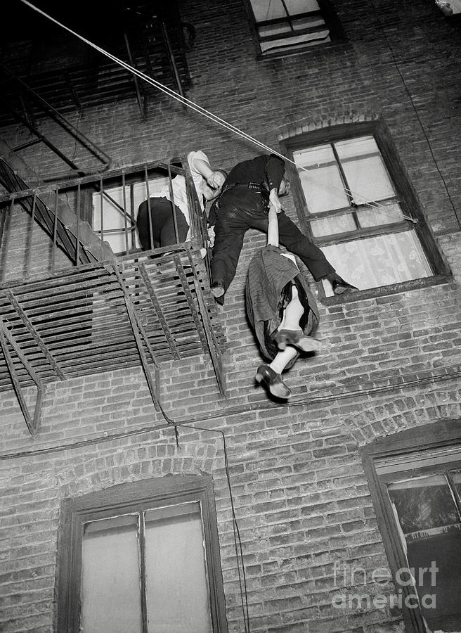 Police Officer Holding Attempted Suicide Photograph by Bettmann